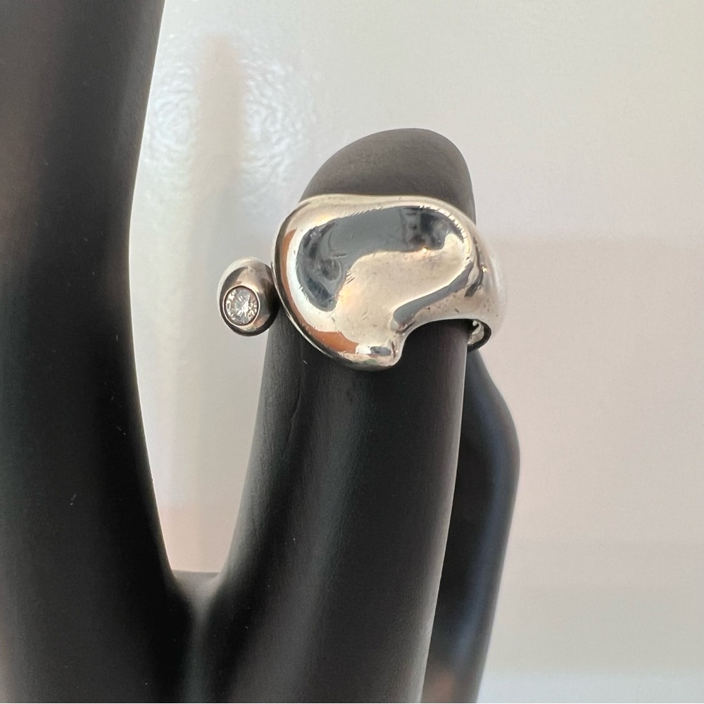Tiffany & Co. Elsa Peretti Full Heart Ring with 0.05 carat diamond.